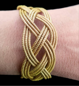 Bracelete caracol capim dourado